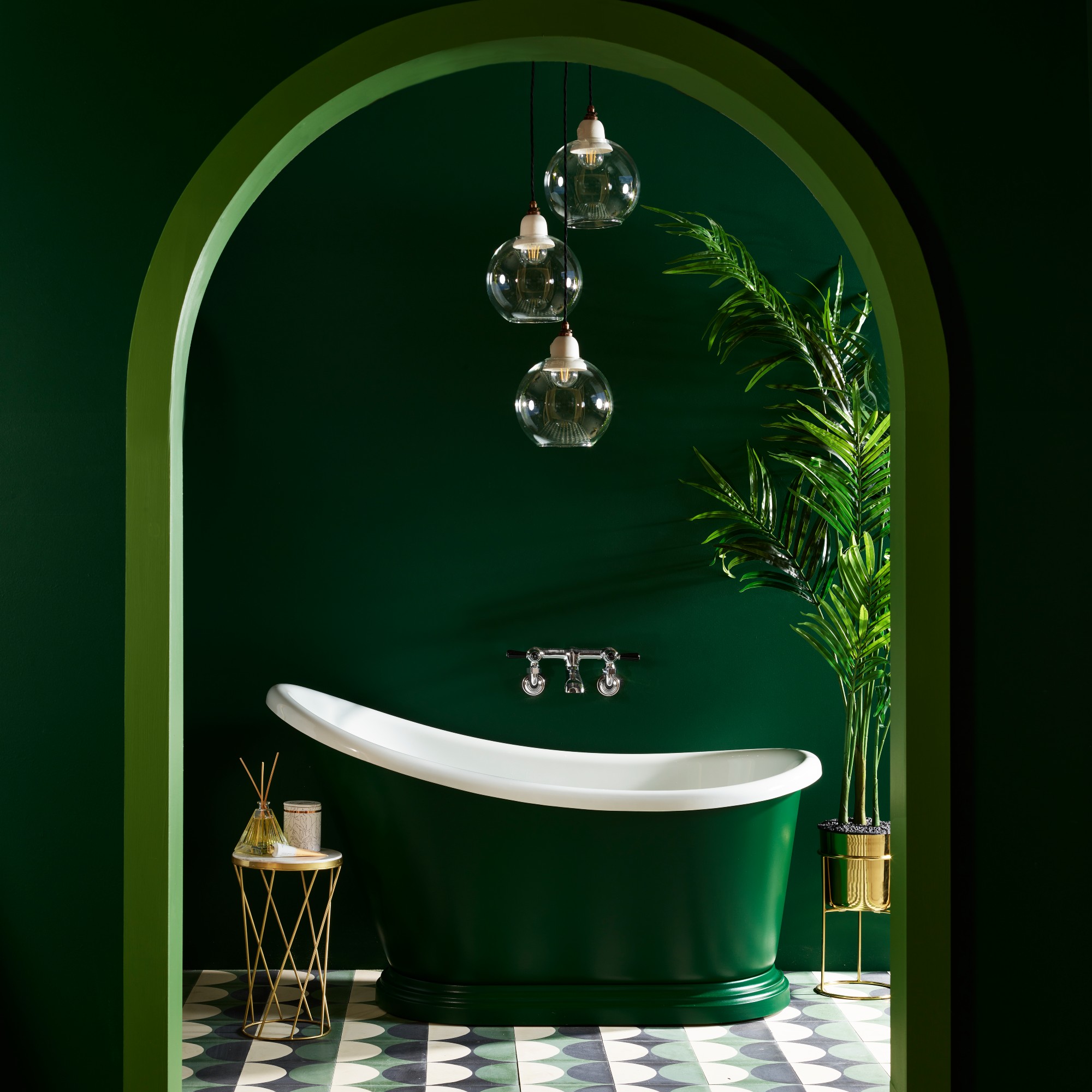 Bedroom drenched in deep forest green