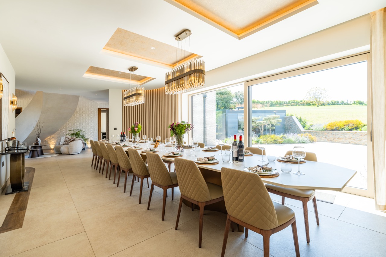 Queens Orchard dining room with bespoke table and views over the garden