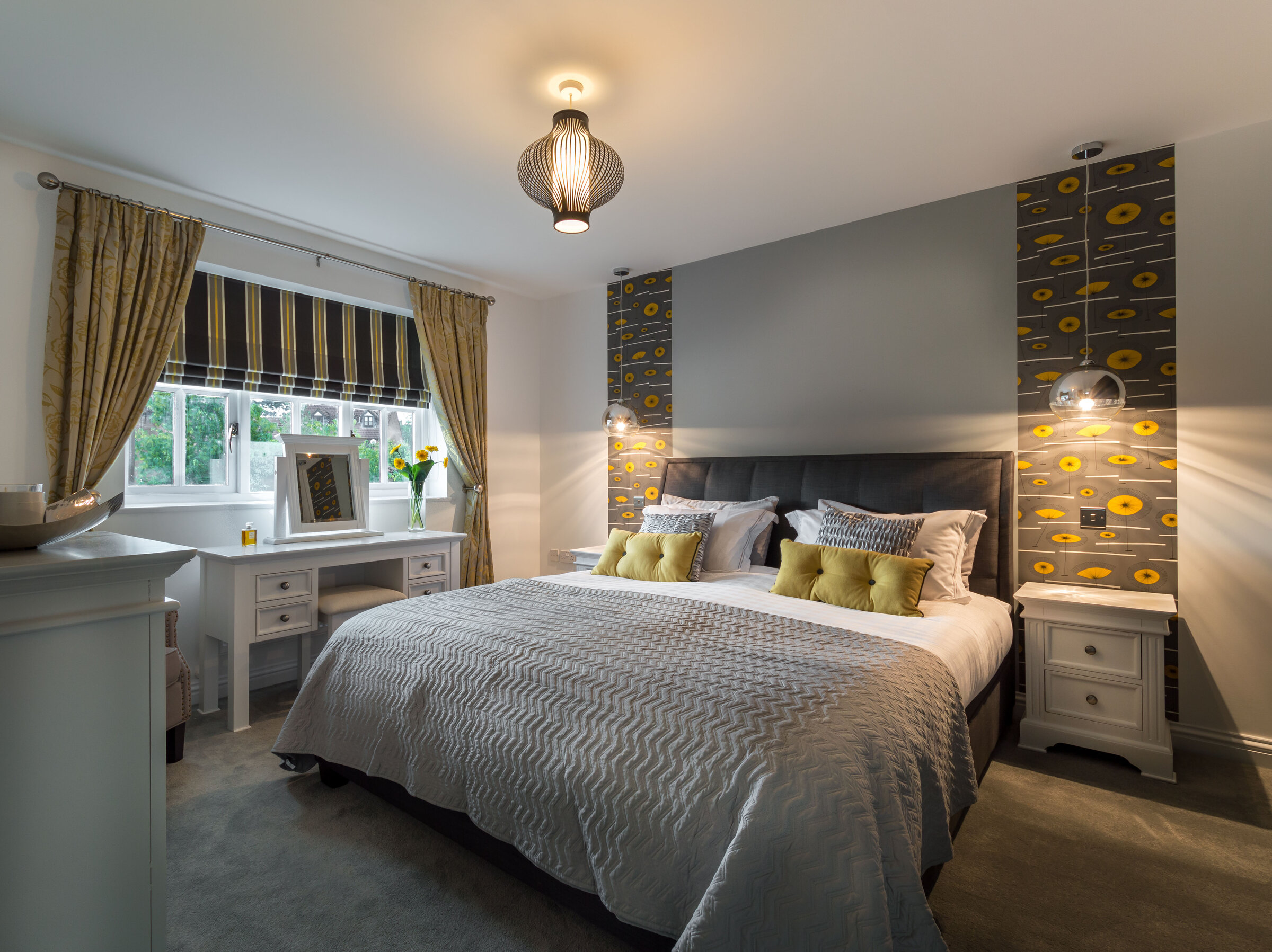 Shenley Brook End bedroom — soft neutrals, layered linen and warm timber accents